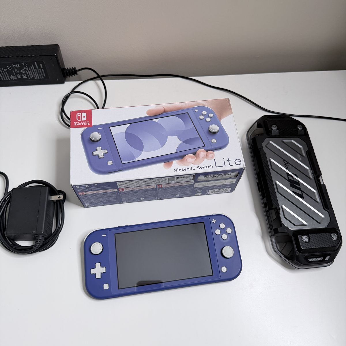 Nintendo Switch Lite (Blue) – Complete w/ Charger & Case