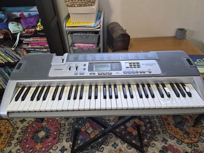 Casio LK-100 Electronic Jeyboard & Stand