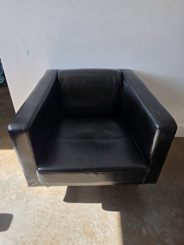Two long brown couches. All leather and One black office chair