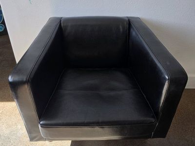 Two long brown couches. All leather and One black office chair