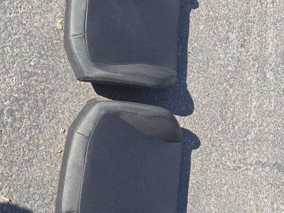 2 Black Seat Covers and more