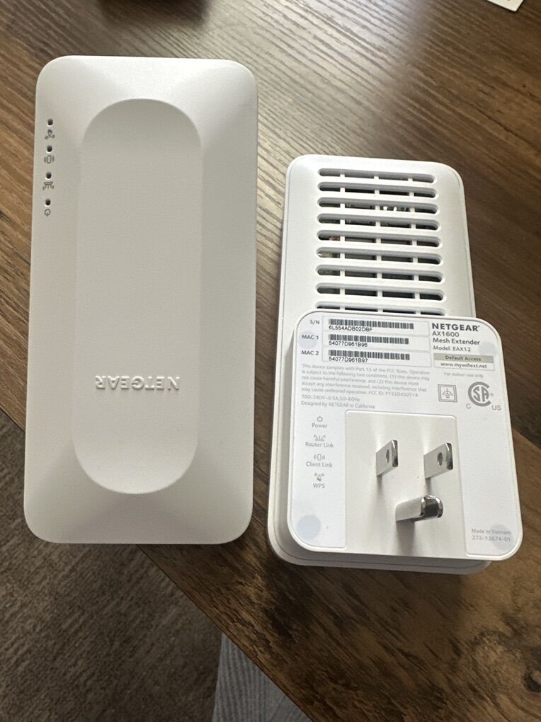 Netgear Modem, Router, And Two Extenders