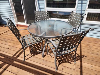 Outdoor Patio Dining Set with 4 Chairs and Glass Table - Used Good Condition