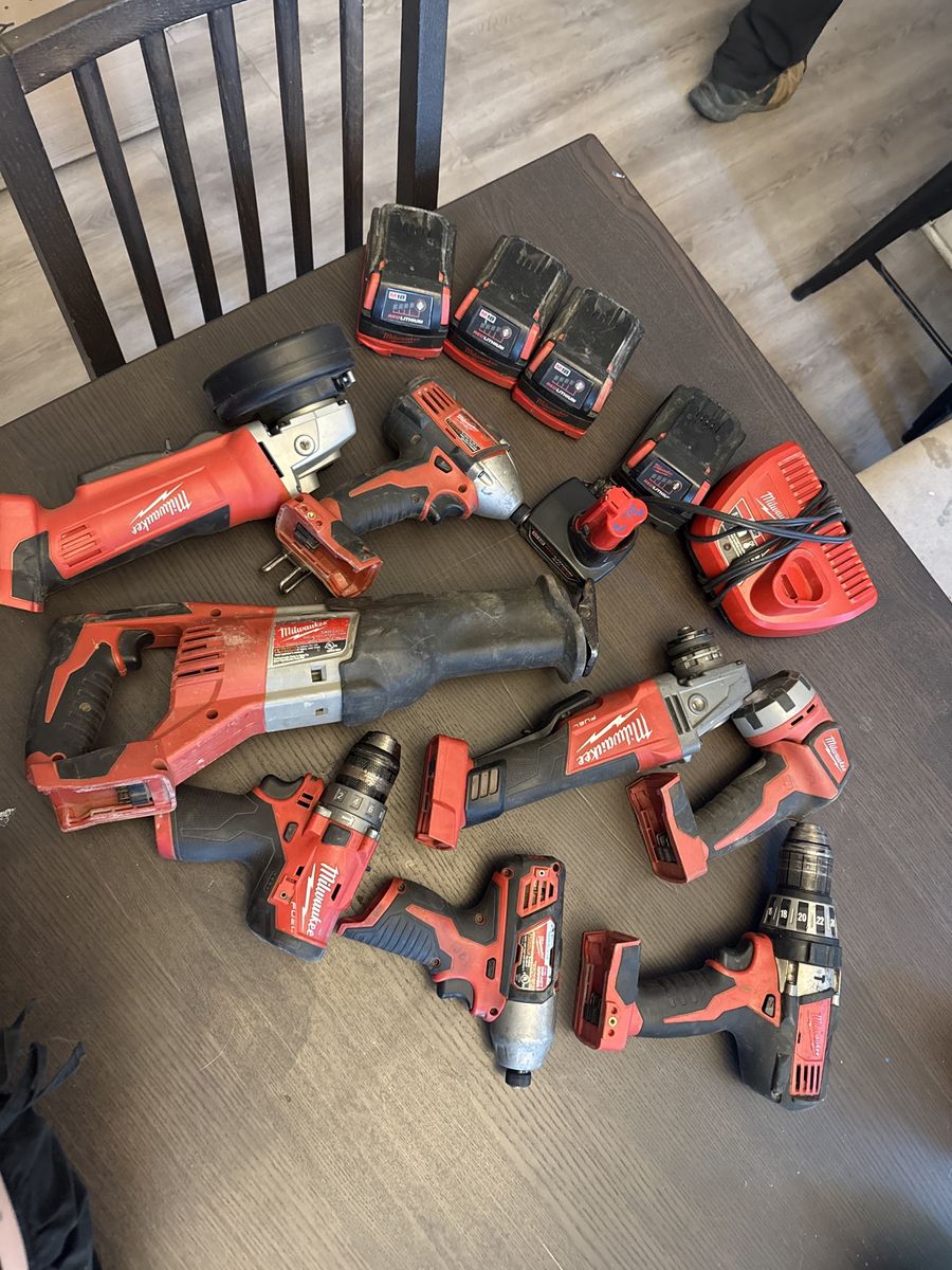 Milwaukee M18 FUEL Cordless Power Tool Set - Drill, Saw, Grinder, Impact, 4 Batteries, Charger
