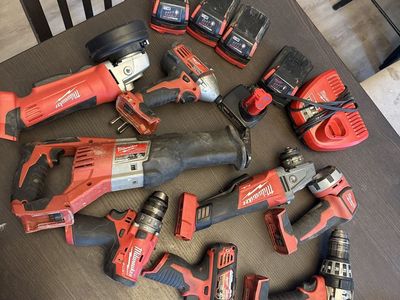 Milwaukee M18 FUEL Cordless Power Tool Set - Drill, Saw, Grinder, Impact, 4 Batteries, Charger