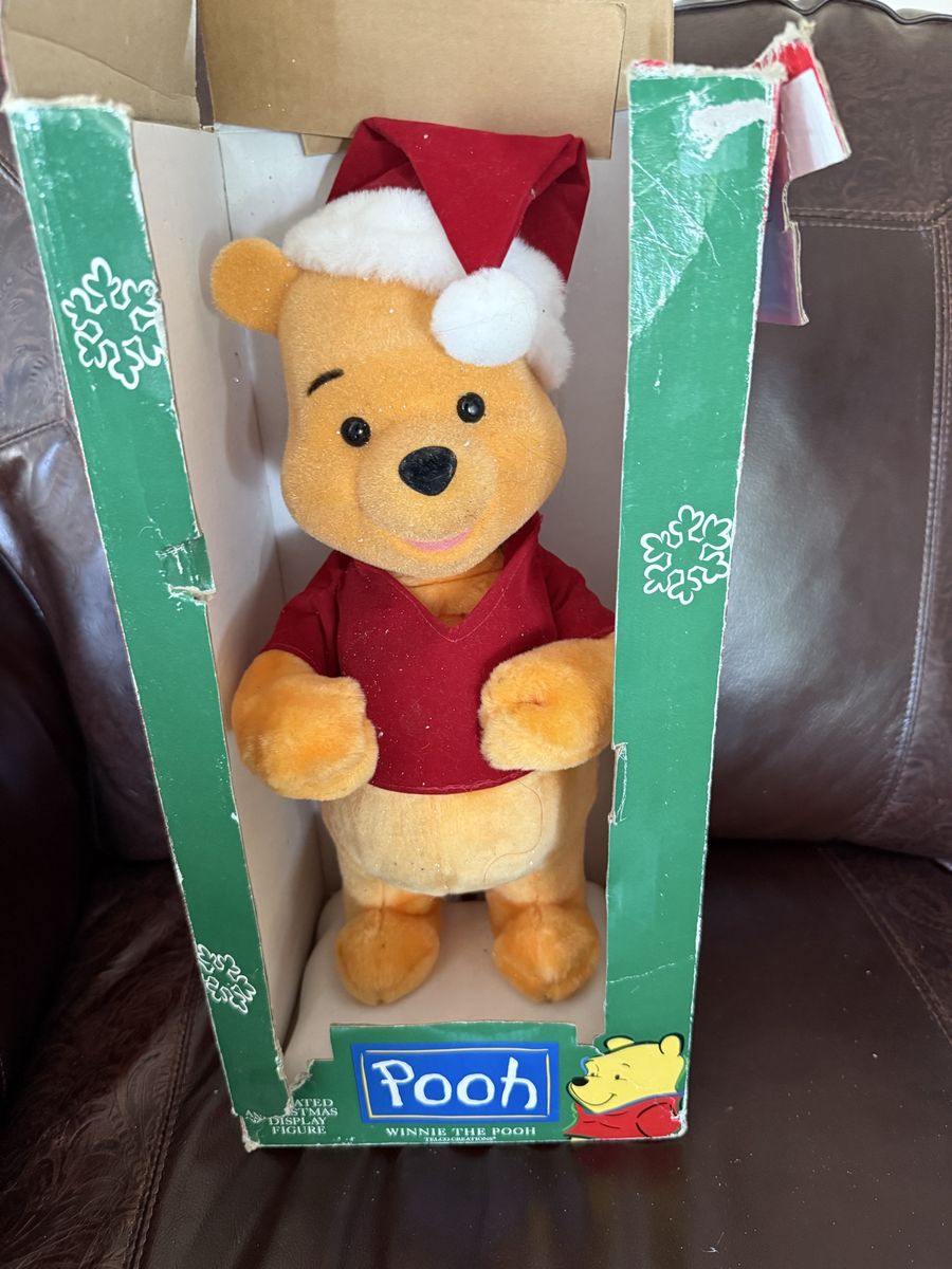Vintage Disney Winnie the Pooh telco it doesn’t work or move but is cute 18”
