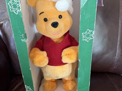 Vintage Disney Winnie the Pooh telco it doesn’t work or move but is cute 18”