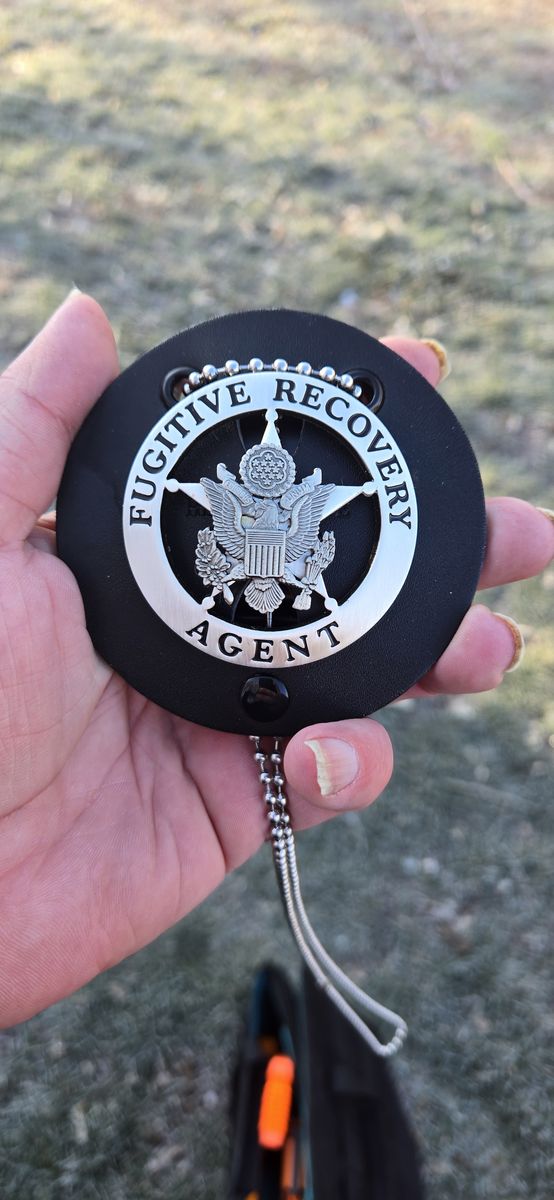 Fugitive recovery badge