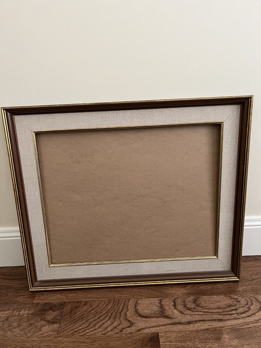 One large solid wood picture frame and 3 smaller frames - all excl condition.