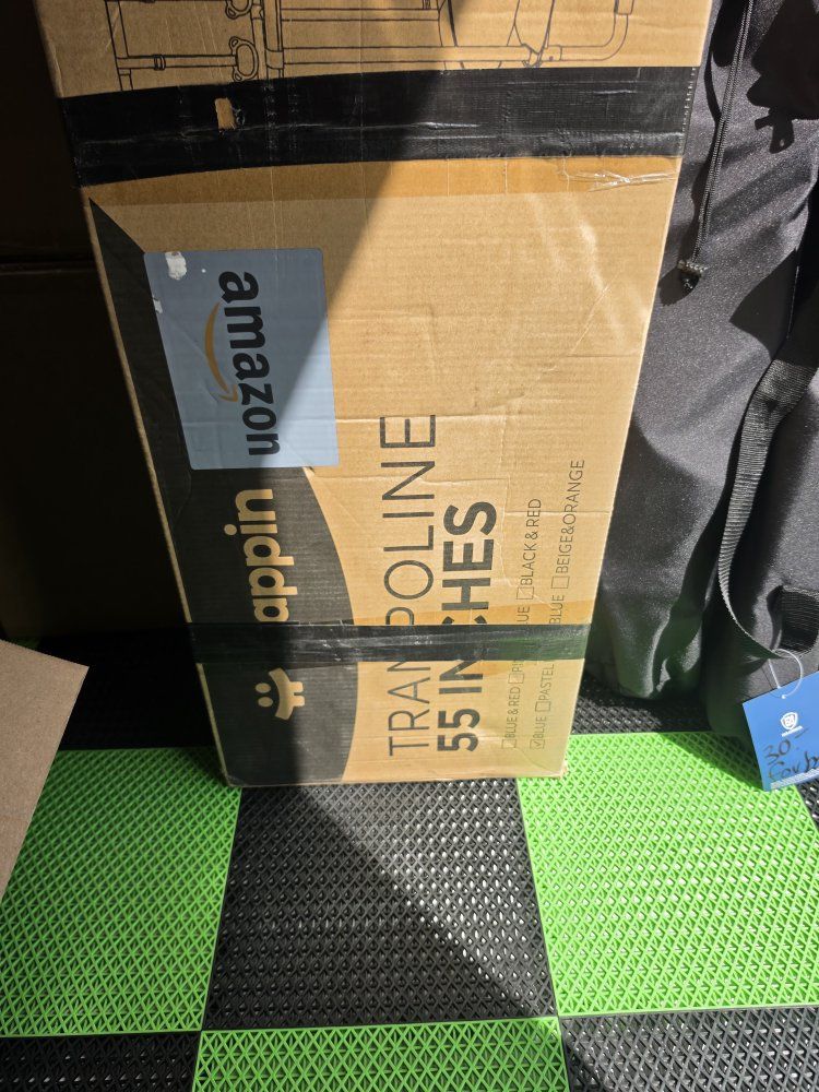 55 in trampoline brand new has enclosure and bar for hanging toys 