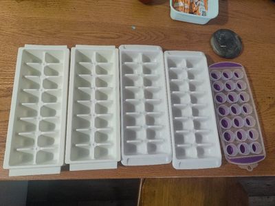 Assorted Ice Cube Trays - 4 White Plastic, 1 Purple Silicone