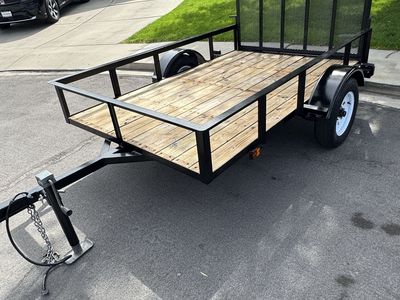 5’ x 8’ Utility Trailer with Wood Deck and Ramp Gate - Used Excellent Condition.