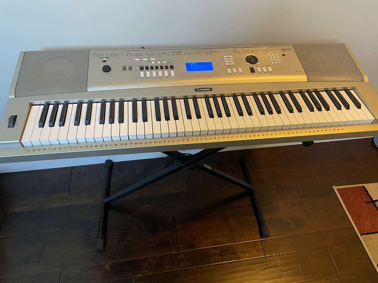 Yamaha DGX-230 Piano/ Keyboard-portable Grand with Ac adapter, stand, music holder, and pedal .