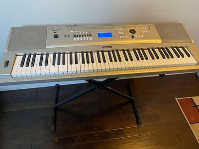 Yamaha DGX-230 Piano/ Keyboard-portable Grand with Ac adapter, stand, music holder, and pedal .
