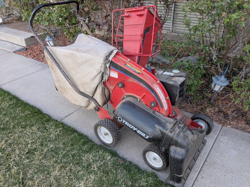 Lawn vacuum wood chipper electric start Troy Bilt