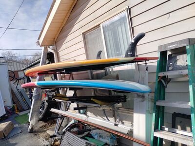 2 11 ft sup boards w/ paddles will sell or trades