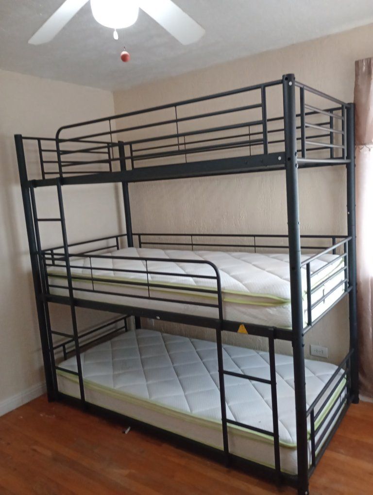Triple Bunk Bed - Sturdy Metal Frame, Space-Saving Design.