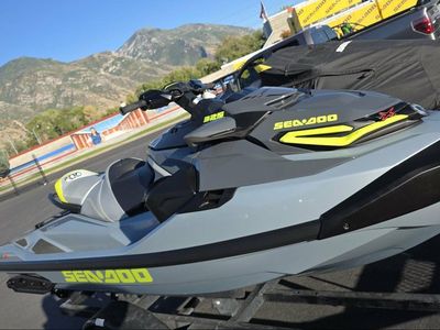 2 wave runners with trailer