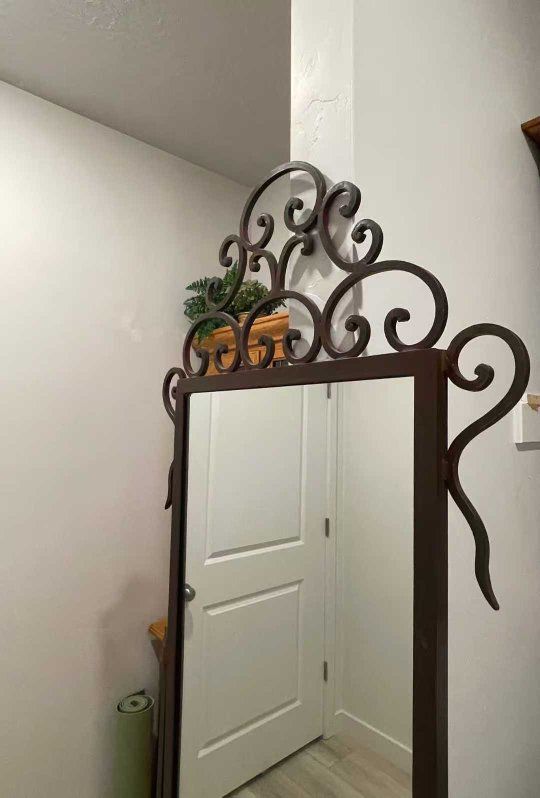 A rare vintage full-length mirror that can be placed anywhere and matched with any decoration style. Solid wrought iron creates 