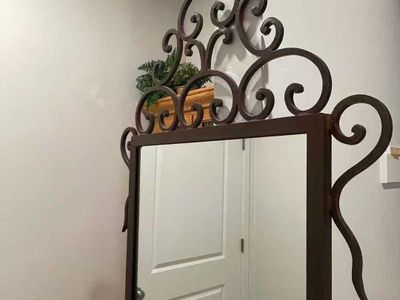 A rare vintage full-length mirror that can be placed anywhere and matched with any decoration style. Solid wrought iron creates