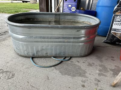 Livestock feeder water trough