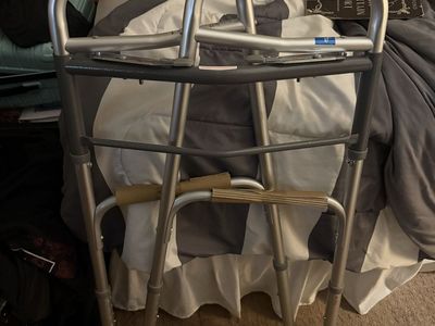 Foldable Medical Walker with Front Wheels and Grey Handgrips