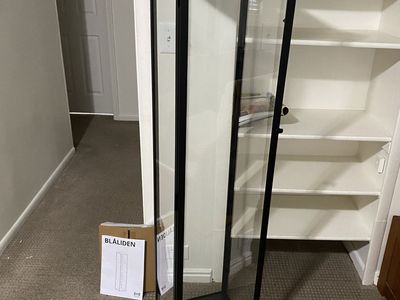 IKEA glass shelf cabinet single door