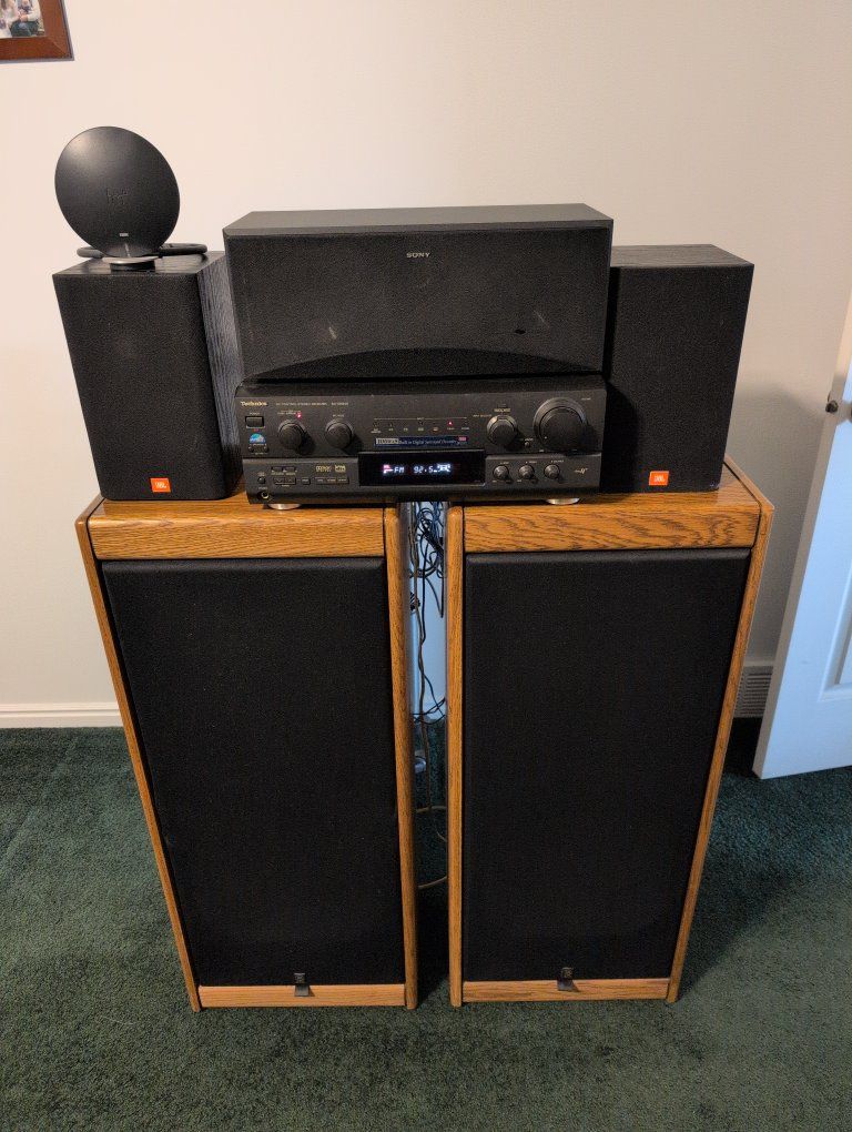 Technics SA-DX940 5.1-Ch Home Theater Receiver, 2 Big Yamaha Speakers, 2 Small JBL speakers, and one Sony Center Spraker