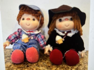 Cute little boy and girl dolls.