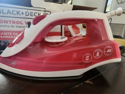 Steam Iron And Ironing Board