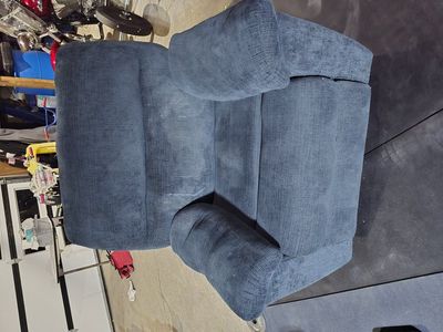 Dark Blue Overstuffed Rocker Recliner one flaw