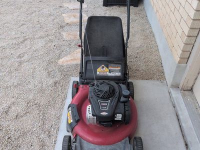 Push lawn mower with Briggs & Stratton engine.