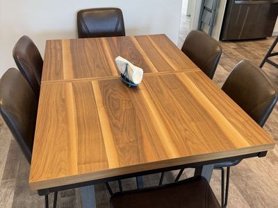 Modern Wood Extendable Dining Table with 6 Brown Leather Chairs