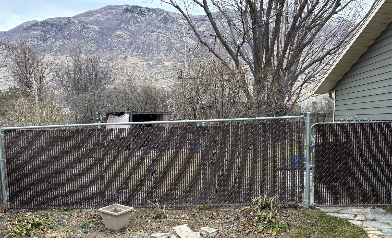 Free Chain link fencing with privacy slats