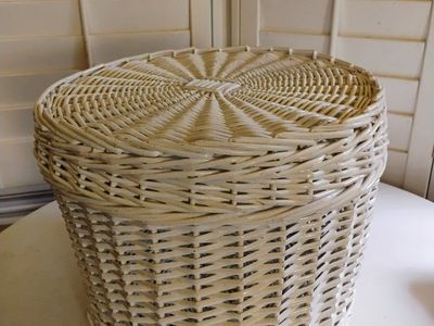 White wicker storage basket with lid