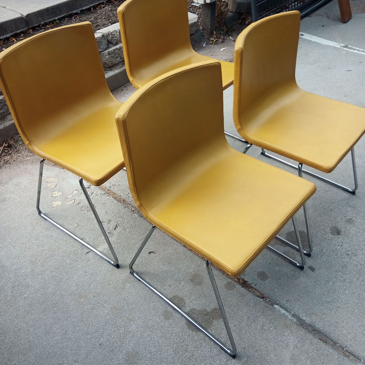 Set of 4 mustard yellow leather and chrome mid century dining chairs