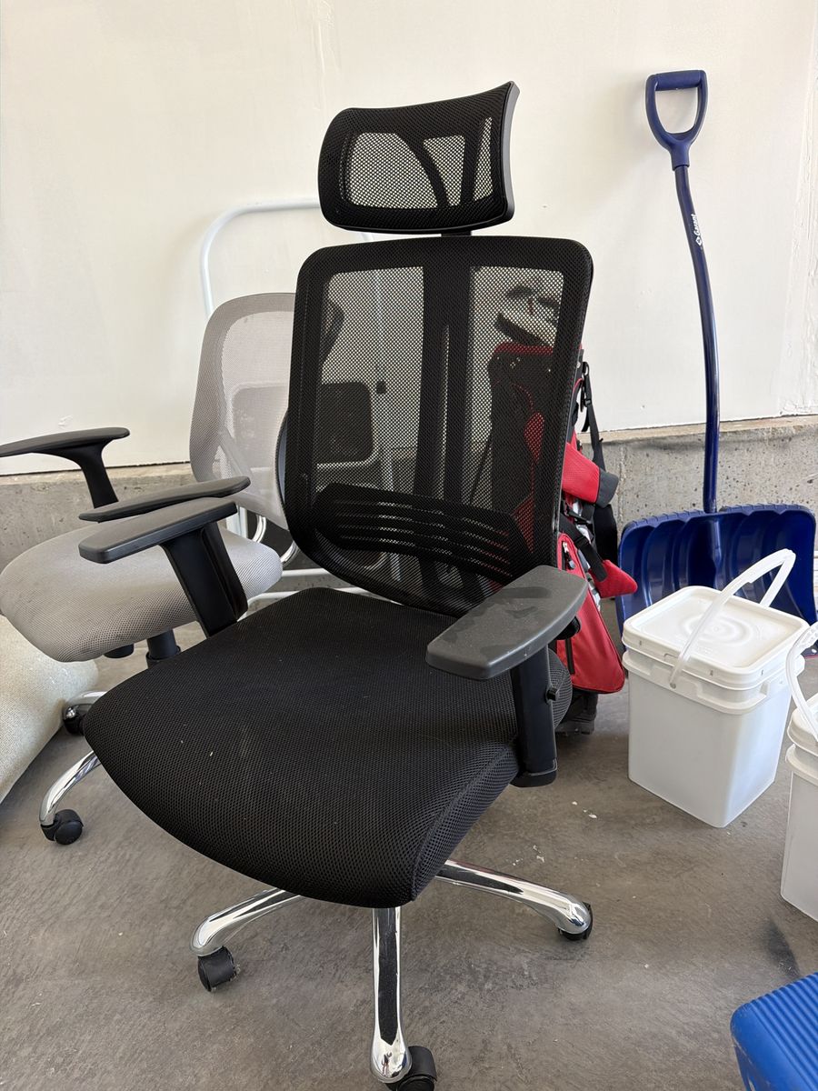 Comfortable Black Mesh Office Chair with Headrest and Armrests