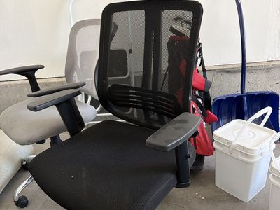 Comfortable Black Mesh Office Chair with Headrest and Armrests