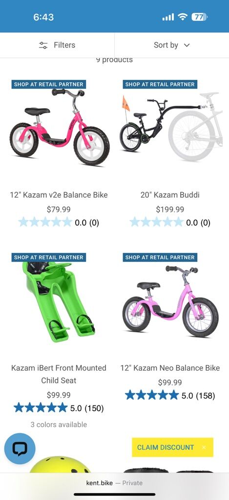 Green and black Kazam balance bike