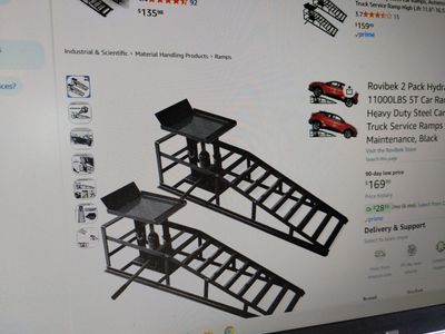 car ramps 2 with hydralic jacks and 2 without 75$ and 125$