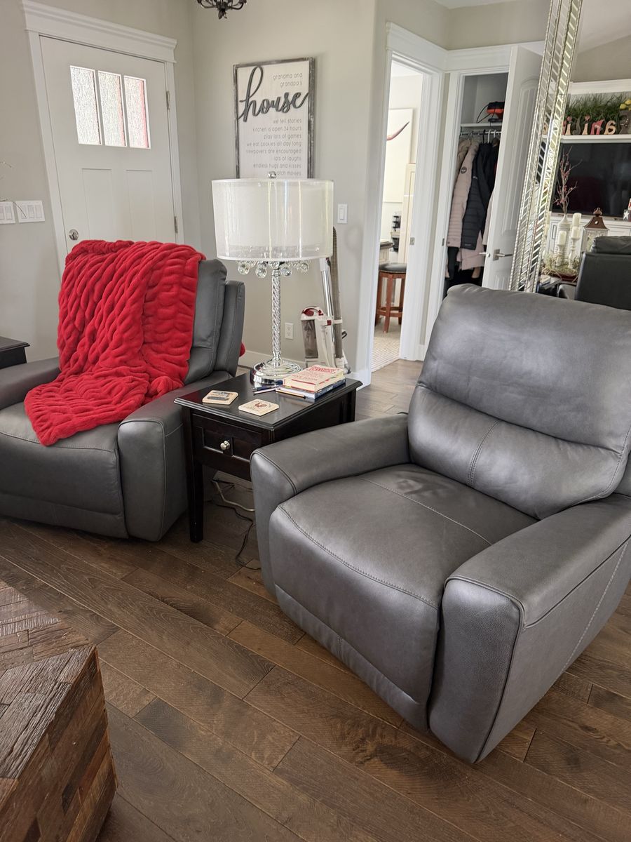 Excellent condition! Gray Leather Reclining Armchair and Reclining Loveseat Set