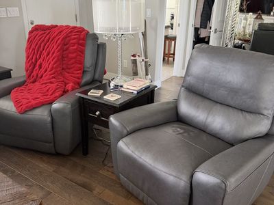 Excellent condition! Gray Leather Reclining Armchair and Reclining Loveseat Set