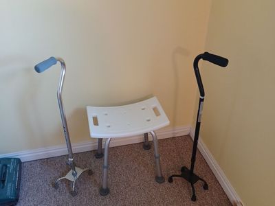 Canes and shower chair. $15 ea.