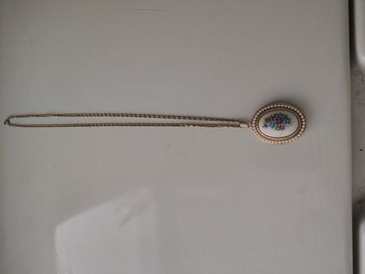 Avon floral locket necklace