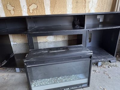 Black TV Stand with Electric Fireplace Insert OBO MOVING QUICK PICK UP ASAP!!