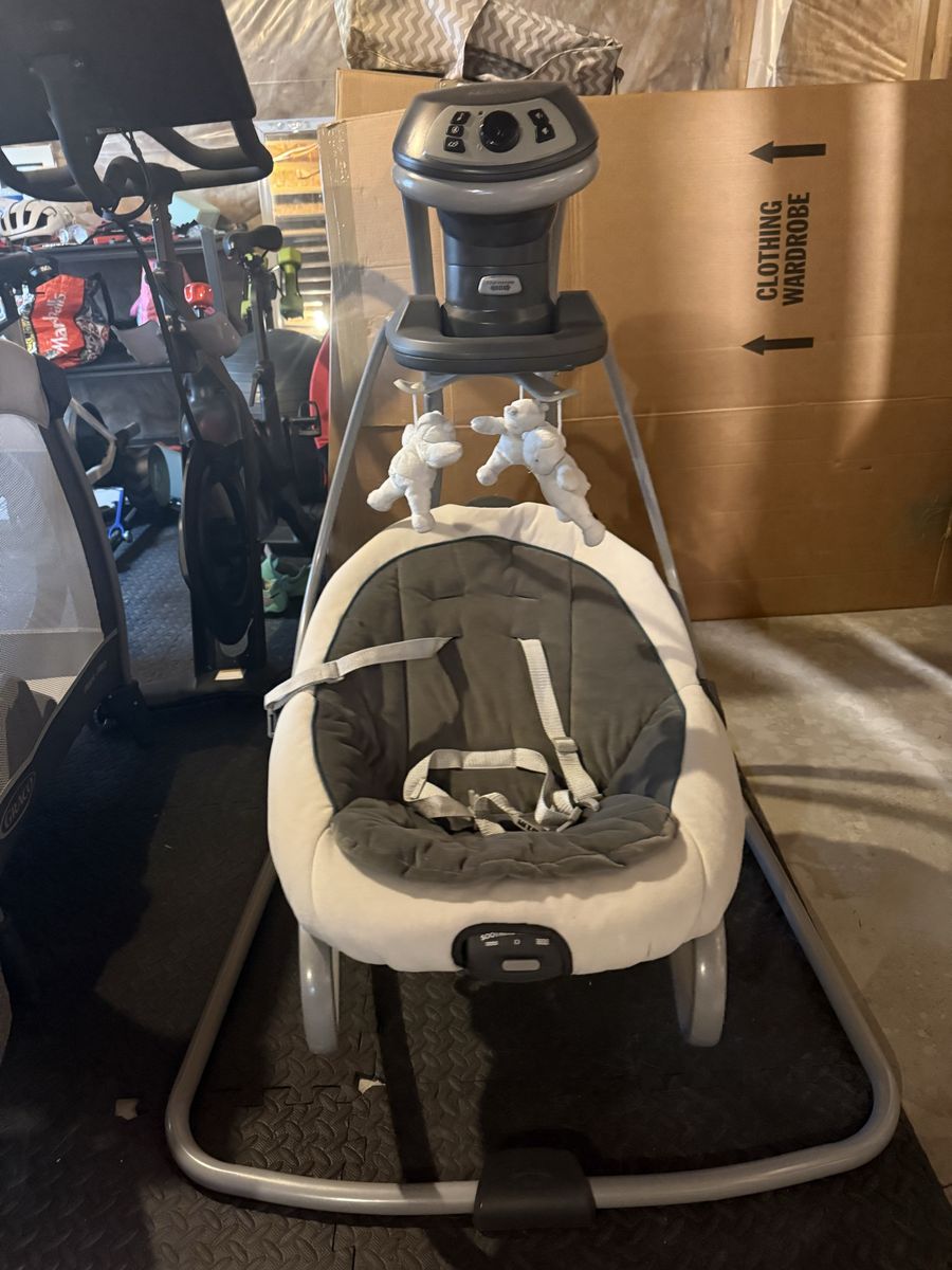Graco Glider LX Gliding Baby Swing - Affix Infant Seat with 6 Speeds & Music, Removable Toy Bar