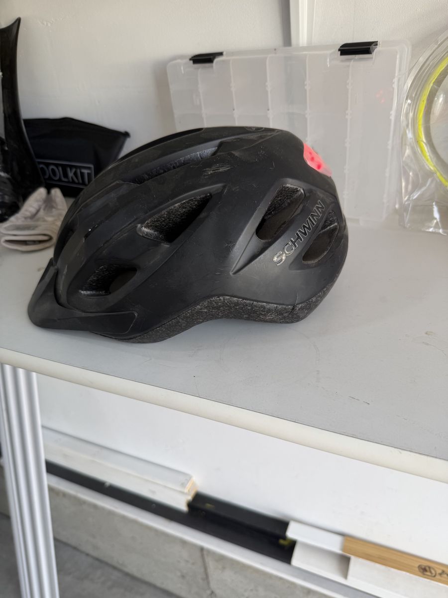 Schwinn Black Cycling Helmet with Integrated Taillight, Adult Size