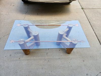 Rustic Log Wood and Glass Coffee Table with Decorative Copper Arrows