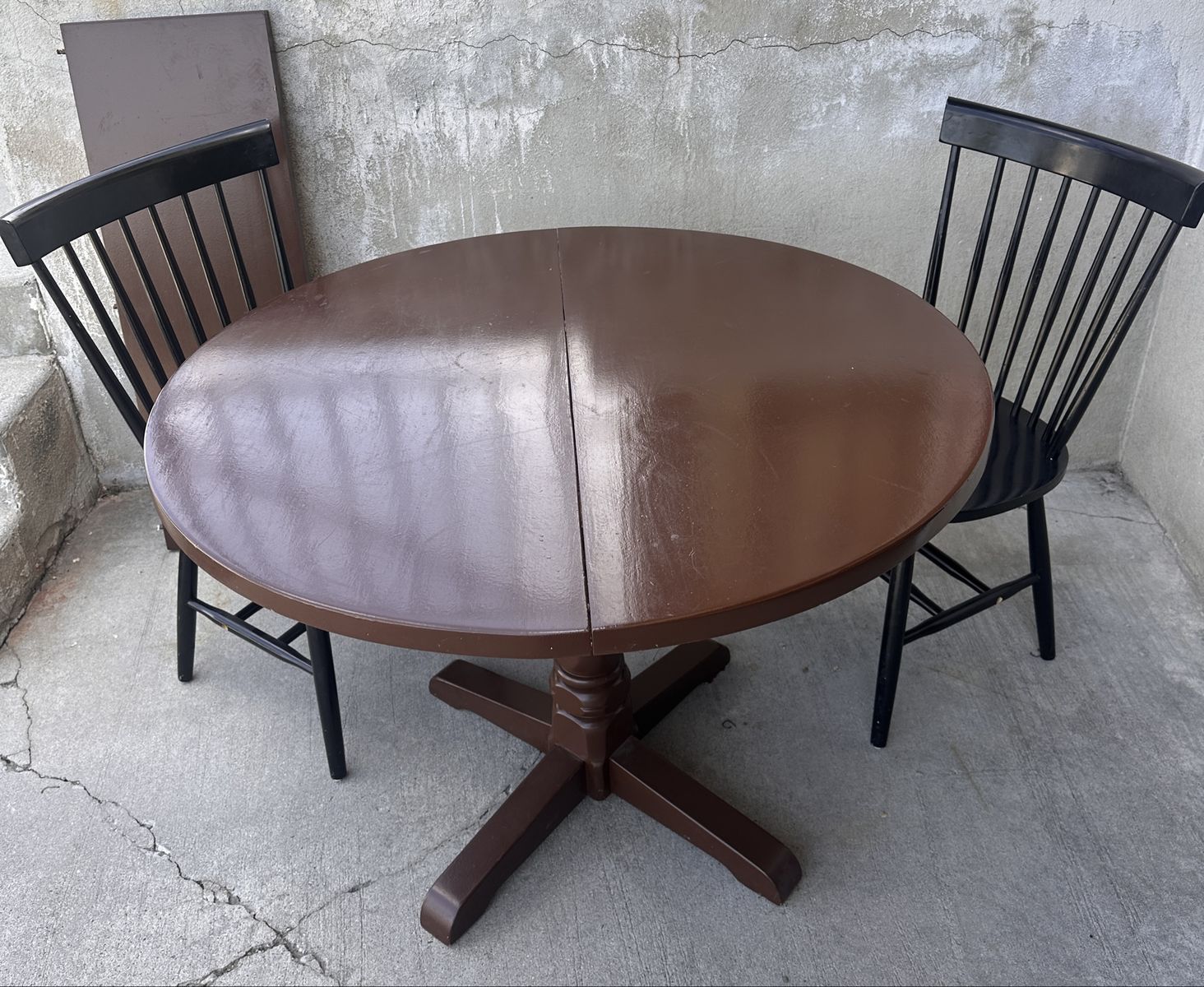 Brown Table with Leaf and 2 Black Chairs