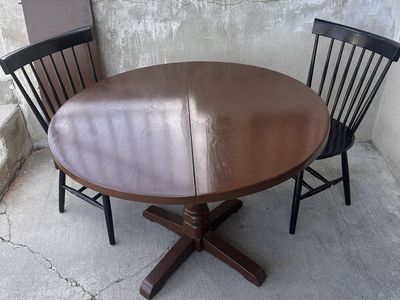 Brown Table with Leaf and 2 Black Chairs